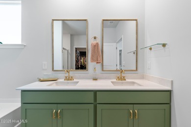 Nestled in the highly sought-after Brunswick Forest community on Cape Fear National At Brunswick Forest in North Carolina - for sale on GolfHomes.com, golf home, golf lot