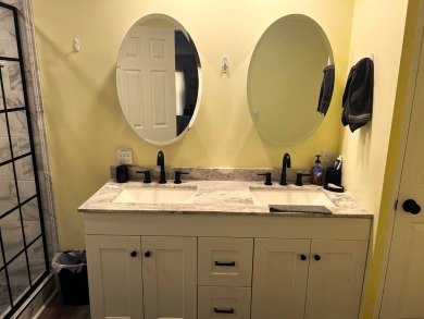 Experience comfortable living in this beautifully updated on Lake Henry Golf Club in Florida - for sale on GolfHomes.com, golf home, golf lot