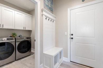 Experience the best of coastal living in this impeccable fully on St. James Bay in Florida - for sale on GolfHomes.com, golf home, golf lot