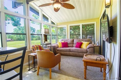 Welcome to your perfect retreat in the iconic Tan Tar A on The Oaks Golf Course in Missouri - for sale on GolfHomes.com, golf home, golf lot