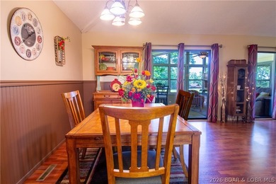 Welcome to your perfect retreat in the iconic Tan Tar A on The Oaks Golf Course in Missouri - for sale on GolfHomes.com, golf home, golf lot