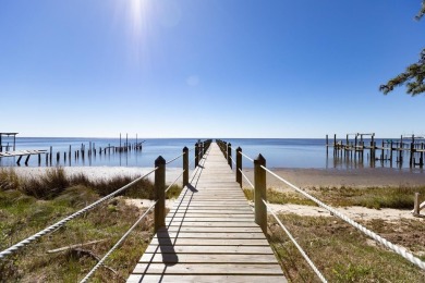 Experience the best of coastal living in this impeccable fully on St. James Bay in Florida - for sale on GolfHomes.com, golf home, golf lot