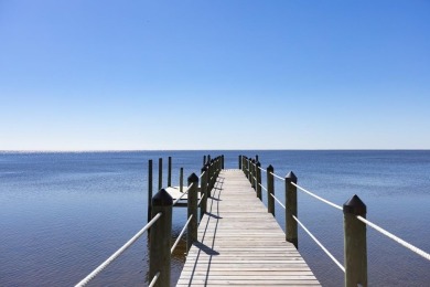 Experience the best of coastal living in this impeccable fully on St. James Bay in Florida - for sale on GolfHomes.com, golf home, golf lot