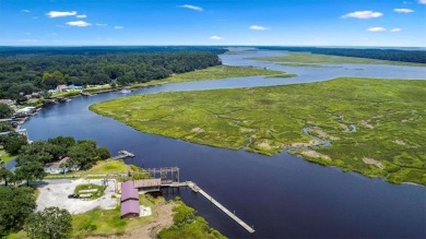 Picture yourself living on the fourth fairway of Sapelo Hammock on Sapelo Hammock Golf Club in Georgia - for sale on GolfHomes.com, golf home, golf lot