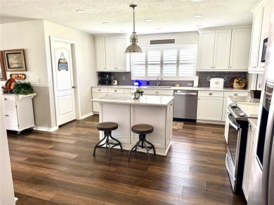 Welcome to this beautiful 4-bedroom, 3-bathroom home situated on on Rolling Greens Executive Golf Community in Florida - for sale on GolfHomes.com, golf home, golf lot