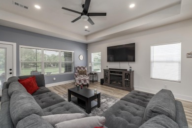 This nearly new, Deaton Home, located on the 17th fairway of the on Ponce De Leon Golf Course in Arkansas - for sale on GolfHomes.com, golf home, golf lot