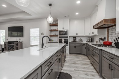 This nearly new, Deaton Home, located on the 17th fairway of the on Ponce De Leon Golf Course in Arkansas - for sale on GolfHomes.com, golf home, golf lot