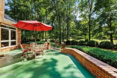 Step into this extraordinary custom-built home in Cypress on Cypress Landing Golf Club in North Carolina - for sale on GolfHomes.com, golf home, golf lot