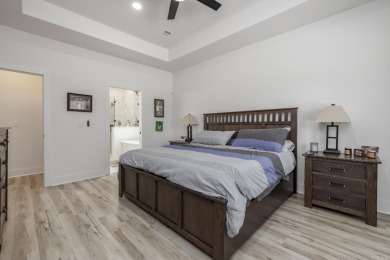 This nearly new, Deaton Home, located on the 17th fairway of the on Ponce De Leon Golf Course in Arkansas - for sale on GolfHomes.com, golf home, golf lot