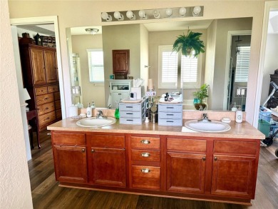 Welcome to this beautiful 4-bedroom, 3-bathroom home situated on on Rolling Greens Executive Golf Community in Florida - for sale on GolfHomes.com, golf home, golf lot