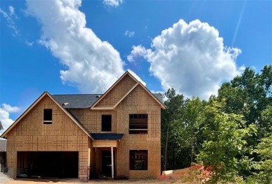 This remarkable *Alexander floor plan* features 4 bedrooms, 2.5 on The Plantation Golf Club in Georgia - for sale on GolfHomes.com, golf home, golf lot