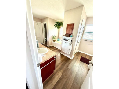 Welcome to this beautiful 4-bedroom, 3-bathroom home situated on on Rolling Greens Executive Golf Community in Florida - for sale on GolfHomes.com, golf home, golf lot