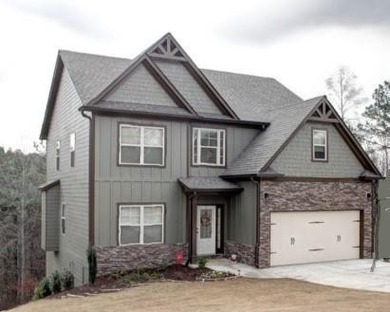 This remarkable *Alexander floor plan* features 4 bedrooms, 2.5 on The Plantation Golf Club in Georgia - for sale on GolfHomes.com, golf home, golf lot