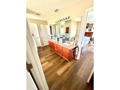 Welcome to this beautiful 4-bedroom, 3-bathroom home situated on on Rolling Greens Executive Golf Community in Florida - for sale on GolfHomes.com, golf home, golf lot