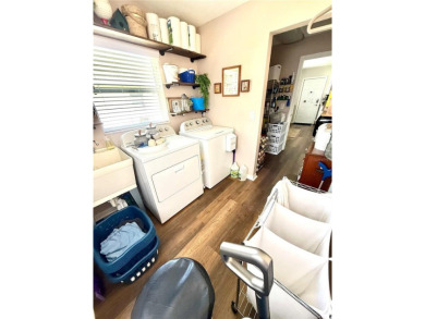 Welcome to this beautiful 4-bedroom, 3-bathroom home situated on on Rolling Greens Executive Golf Community in Florida - for sale on GolfHomes.com, golf home, golf lot
