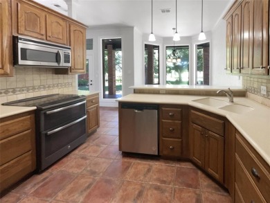Welcome home to your 3-bedroom 2 bath home with ceramic tile on Pecan Plantation Country Club in Texas - for sale on GolfHomes.com, golf home, golf lot
