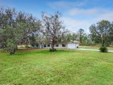 Beautiful 3-bedroom, 2-bath Corner Lot home with tile roof on Indian Lake Estates Golf and Country Club in Florida - for sale on GolfHomes.com, golf home, golf lot