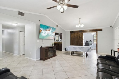 Beautiful 3-bedroom, 2-bath Corner Lot home with tile roof on Indian Lake Estates Golf and Country Club in Florida - for sale on GolfHomes.com, golf home, golf lot