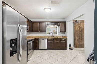 Beautiful 3-bedroom, 2-bath Corner Lot home with tile roof on Indian Lake Estates Golf and Country Club in Florida - for sale on GolfHomes.com, golf home, golf lot