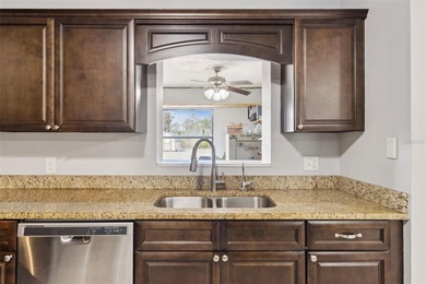 Beautiful 3-bedroom, 2-bath Corner Lot home with tile roof on Indian Lake Estates Golf and Country Club in Florida - for sale on GolfHomes.com, golf home, golf lot