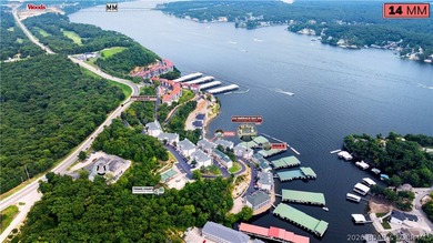 Not 1 but 2 BOAT SLIPS INCLUDED. Top-floor, end-unit lakefront on Seasons Ridge At Four Seasons in Missouri - for sale on GolfHomes.com, golf home, golf lot