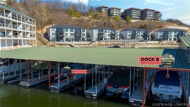 Not 1 but 2 BOAT SLIPS INCLUDED. Top-floor, end-unit lakefront on Seasons Ridge At Four Seasons in Missouri - for sale on GolfHomes.com, golf home, golf lot