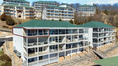 Not 1 but 2 BOAT SLIPS INCLUDED. Top-floor, end-unit lakefront on Seasons Ridge At Four Seasons in Missouri - for sale on GolfHomes.com, golf home, golf lot