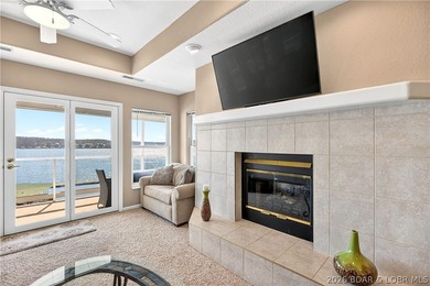Not 1 but 2 BOAT SLIPS INCLUDED. Top-floor, end-unit lakefront on Seasons Ridge At Four Seasons in Missouri - for sale on GolfHomes.com, golf home, golf lot
