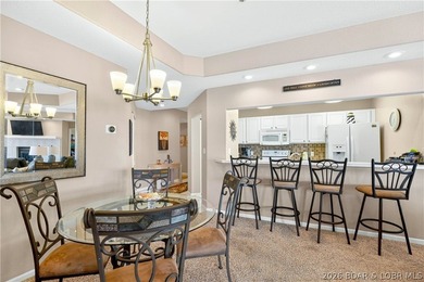 Not 1 but 2 BOAT SLIPS INCLUDED. Top-floor, end-unit lakefront on Seasons Ridge At Four Seasons in Missouri - for sale on GolfHomes.com, golf home, golf lot