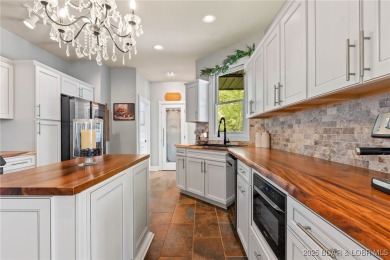 You'll be captivated by the custom craftsmanship  elegant design on The Club At Old Kinderhook in Missouri - for sale on GolfHomes.com, golf home, golf lot