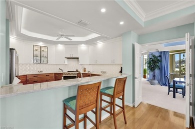 Enjoy panoramic Golf course views from the large screened lanai on Club at Pelican Bay Golf Course in Florida - for sale on GolfHomes.com, golf home, golf lot