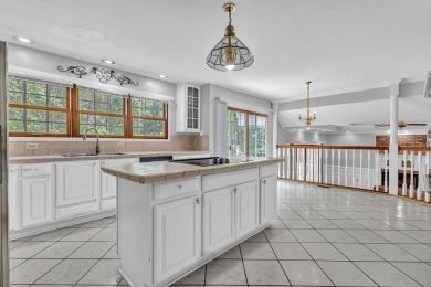 Get ready to fall in love with this stunning all-brick 6-bedroom on Fairfield Plantation Golf and Country Club in Georgia - for sale on GolfHomes.com, golf home, golf lot