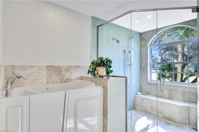 Enjoy panoramic Golf course views from the large screened lanai on Club at Pelican Bay Golf Course in Florida - for sale on GolfHomes.com, golf home, golf lot