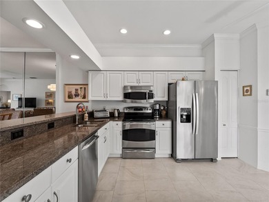 Experience the ultimate maintenance-free lifestyle in this on Heritage Oaks Golf and Country Club in Florida - for sale on GolfHomes.com, golf home, golf lot