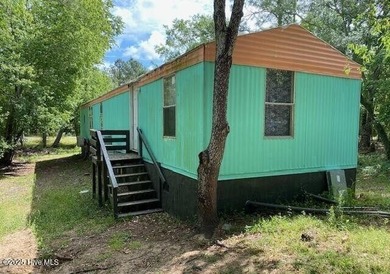 Excellent opportunity to acquire a fully rented four-property on The Lakes Country Club in North Carolina - for sale on GolfHomes.com, golf home, golf lot