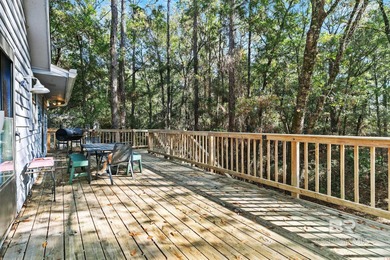 Looking for a home that feels like a cozy retreat tucked away in on Lake Forest Yacht and Country Club in Alabama - for sale on GolfHomes.com, golf home, golf lot
