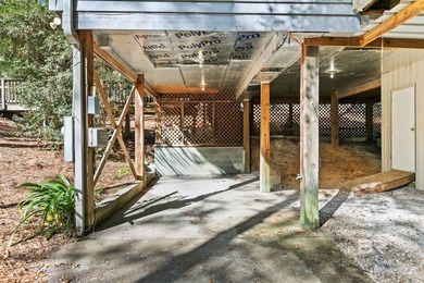 Looking for a home that feels like a cozy retreat tucked away in on Lake Forest Yacht and Country Club in Alabama - for sale on GolfHomes.com, golf home, golf lot