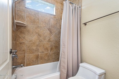 Custom built home in Indian River Preserve Golf Community, sits on Walkabout Golf and Country Club in Florida - for sale on GolfHomes.com, golf home, golf lot