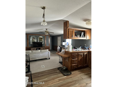 Excellent opportunity to acquire a fully rented four-property on The Lakes Country Club in North Carolina - for sale on GolfHomes.com, golf home, golf lot