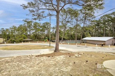 Looking for a home that feels like a cozy retreat tucked away in on Lake Forest Yacht and Country Club in Alabama - for sale on GolfHomes.com, golf home, golf lot