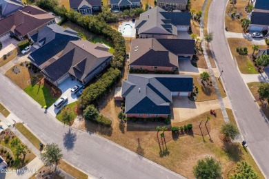 Welcome to this stunning home in the resort-style, gated golf on Compass Pointe Golf Course in North Carolina - for sale on GolfHomes.com, golf home, golf lot