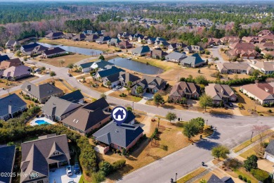 Welcome to this stunning home in the resort-style, gated golf on Compass Pointe Golf Course in North Carolina - for sale on GolfHomes.com, golf home, golf lot