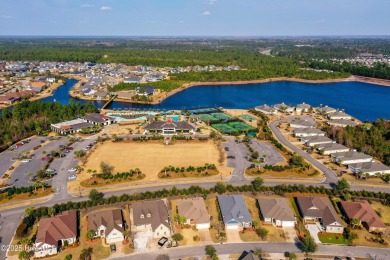Welcome to this stunning home in the resort-style, gated golf on Compass Pointe Golf Course in North Carolina - for sale on GolfHomes.com, golf home, golf lot