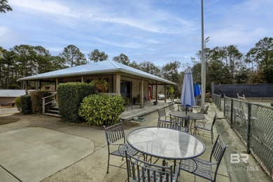 Looking for a home that feels like a cozy retreat tucked away in on Lake Forest Yacht and Country Club in Alabama - for sale on GolfHomes.com, golf home, golf lot
