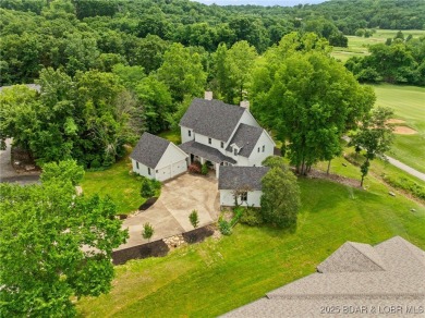 You'll be captivated by the custom craftsmanship  elegant design on The Club At Old Kinderhook in Missouri - for sale on GolfHomes.com, golf home, golf lot