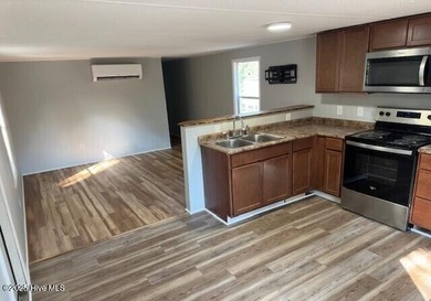 Excellent opportunity to acquire a fully rented four-property on The Lakes Country Club in North Carolina - for sale on GolfHomes.com, golf home, golf lot