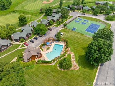 You'll be captivated by the custom craftsmanship  elegant design on The Club At Old Kinderhook in Missouri - for sale on GolfHomes.com, golf home, golf lot