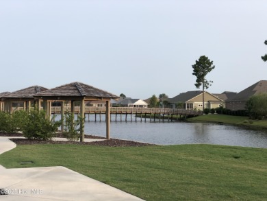 Welcome to this stunning home in the resort-style, gated golf on Compass Pointe Golf Course in North Carolina - for sale on GolfHomes.com, golf home, golf lot