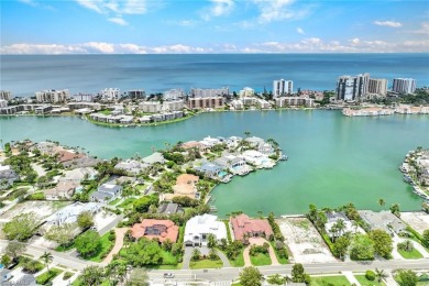 Experience unparalleled luxury in this exceptional bay front on The Moorings Country Club in Florida - for sale on GolfHomes.com, golf home, golf lot