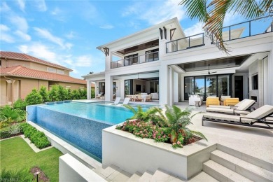 Experience unparalleled luxury in this exceptional bay front on The Moorings Country Club in Florida - for sale on GolfHomes.com, golf home, golf lot